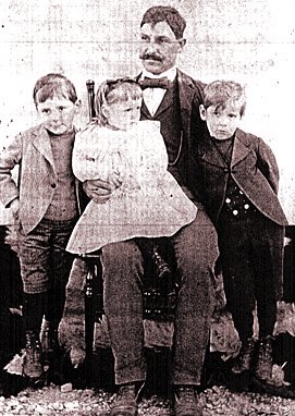 Isaac Martin Miller (1868-1931) and three children left to right: Elroy, Stella, and Albert Miller